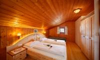 Ferienwohnung Laugen - Schlafzimmer mit einem Doppelbett